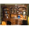 Image 1 : LARGE MED. WOOD WALL UNIT WITH DRAWERS AND GLASS CENTER CABINET.  RETAIL $5,680.00