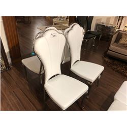 SET OF FOUR WHITE LEATHER DINING ROOM CHAIRS.  RETAIL $520.00 EACH