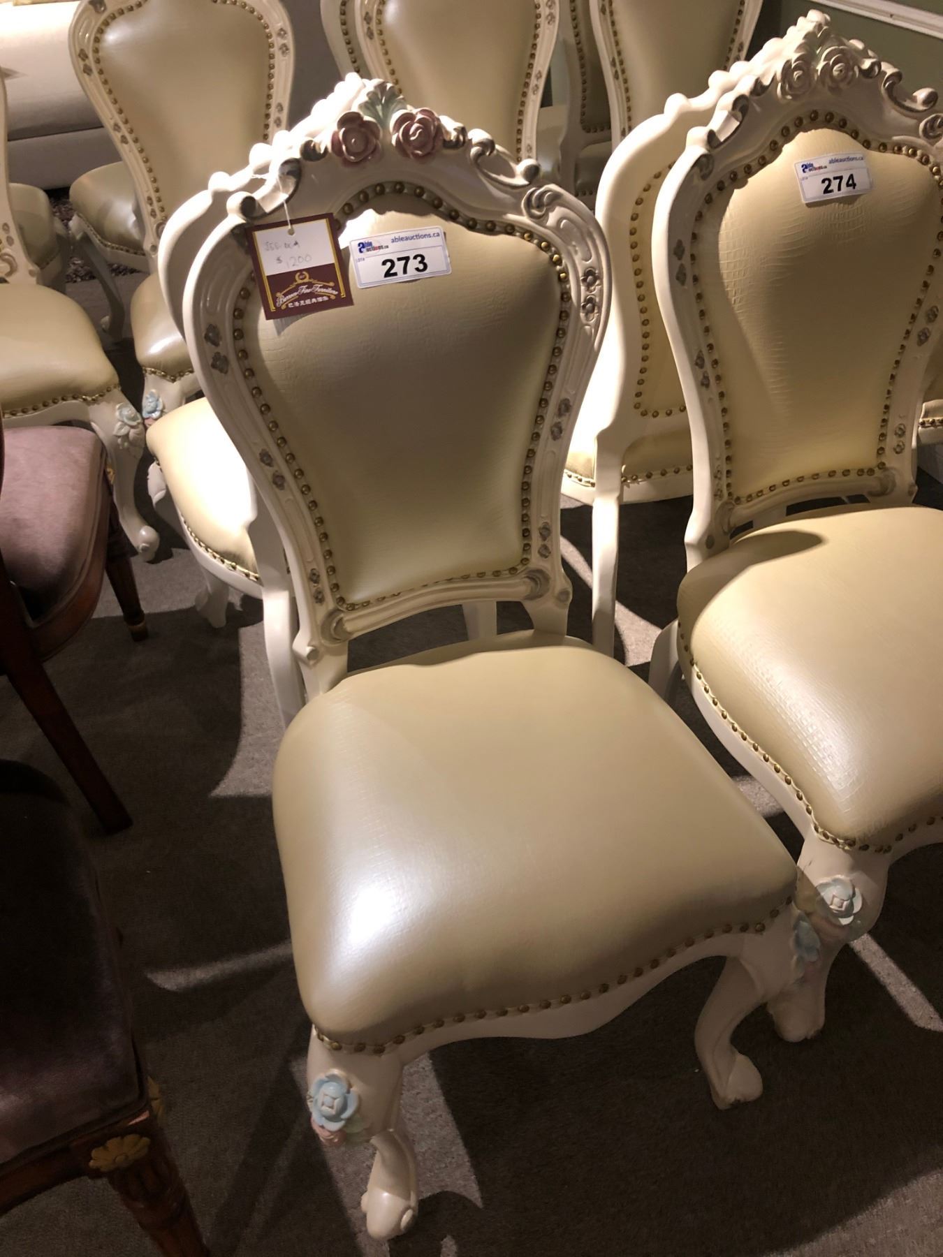 PAIR OF BRASS TACKED IVORY COLOURED FORMAL DINING ROOM CHAIRS. RETAIL