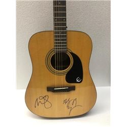 Signed Miley and Billy Ray Cyrus Signed Guitar