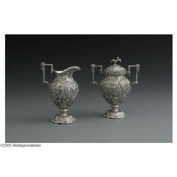 An S. Kirk & Son Silver Repousse Cream and Sugar An American Silver Cream And Sugar