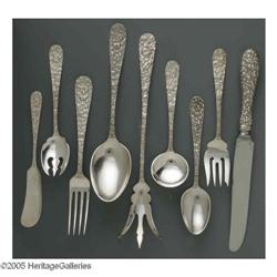A Stieff Co. Silver 'Repousse' Flatware Set An American Silver Flatware Set