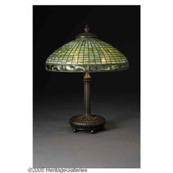 A Tiffany Studios Glass and Bronze Lamp An American Glass and Bronze Lamp