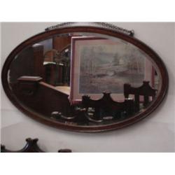 wood framed oval mirror