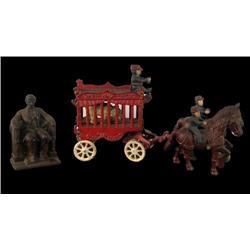 Lot of 2   Cast Iron Items ; "Abe" & Circus Wagon