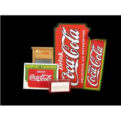Lot of Coca-Cola items;