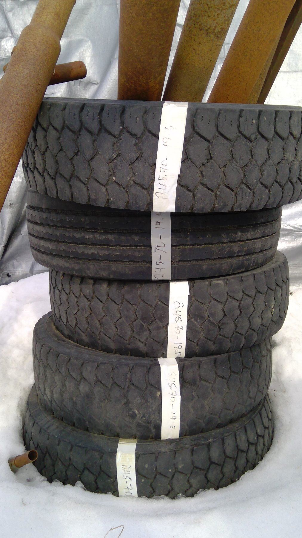 FIVE MISMATCHED TREAD TIRES 245/70/19.5