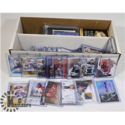 LOT OF OVER 55 SIGNED, NUMBERED & FABRIC HOCKEY