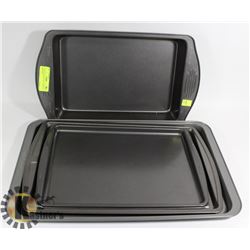 STACK OF ESTATE BAING SHEETS AND PANS