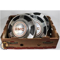 5 VINTAGE GMC HUBCAPS.