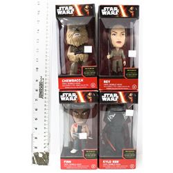 LOT OF 4 STAR WARS BOBBLE HEADS.