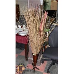 HORN STYLE VASE WITH TWIGS.