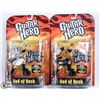 Image 1 : LOT OF 2 ASSORTED GUITAR HERO FIGURES.