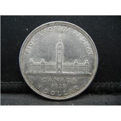 1939 Canada Silver Dollar.  Nice AU 58.  Slight wear.  Original.