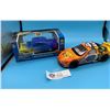 Image 1 : Lot of 2 Diecast Cars. 1 in Museum Case and Packaging 1:43 Scale, and Cheerios Race Car.