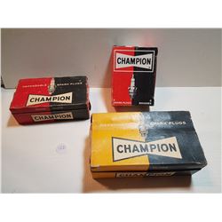 3 VINTAGE CHAMPION BOXES WITH 25 SPARK PLUGS