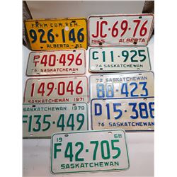 7 SASKATCHEWAN LICENSE PLATES AND 2 ALBERTA LICENSE PLATE