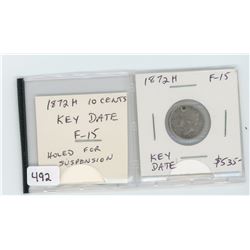 1872H silver 10 cents. F-15. Key Date. Holed for suspension.