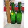 Image 1 : TWO EMBOSSED GREEN SODA BOTTLES (MOUNTIES)