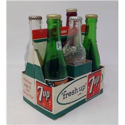 6 PACK ASSORTED GLASS BOTTLES IN A VINTAGE 7-UP BOX