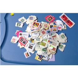 BAG OF USED ASSORTED STAMPS