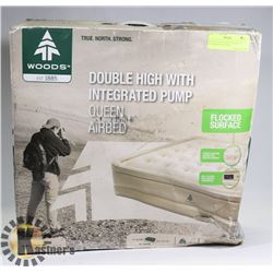 WOODS QUEEN SIZE AIR BED W/ INTEGRATED PUMP
