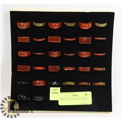 DISPLAY OF 32 ASSORTED RINGS.