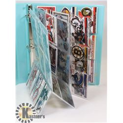 BINDER OF NHL HOCKEY CARDS.