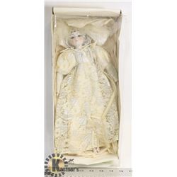 VINTAGE PORCELAIN DOLL IN ORIGINAL BOX.