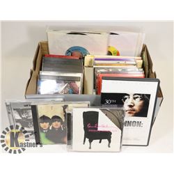 LOT OF BEATLES CDS, 45S AND MORE.