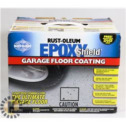 NEW BOX OF RUSTOLEUM GARAGE FLOOR COATING.