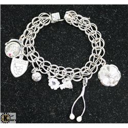 STERLING SILVER CHARM BRACELET WITH CHARMS.