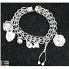 Image 1 : STERLING SILVER CHARM BRACELET WITH CHARMS.