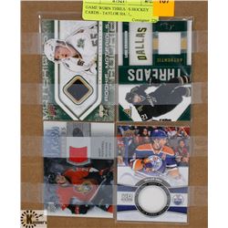 GAME WORN THREADS HOCKEY CARDS - TAYLOR HALL,