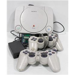 SONY PLAYSTATION ONE WITH MEMORY CARD.