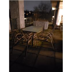 Glass top patio table with 6 chairs C