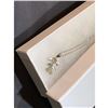 Image 2 : Contemporary designer necklace with child motif charm.