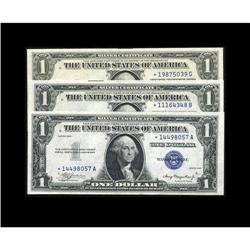 Fr. 1607* $1 1935 Silver Certificate. AU. Three $1 Silver Stars.