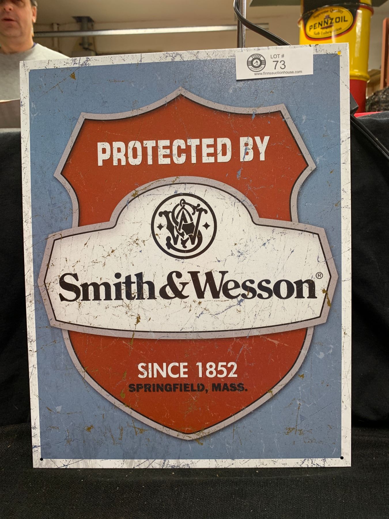 Protected by Smith and Wesson Sign. Reproduction Tin Sign 13' h x 16' w