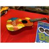 Image 2 : A Beatles Poster for Maple Leaf Gardens and A Simpson's Child's Guitar that Needs Strings