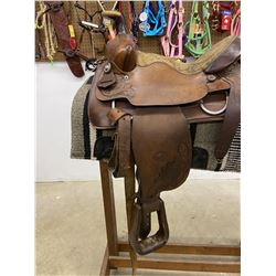 HEREFORD  TEX TAN BRAND HAND TOOLED ROPING  SADDLE