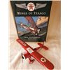 Image 1 : TEXACO 1931 STEARMON AIRPLANE - ERTL (1995) 3RD IN SERIES 12" W BY 8" L