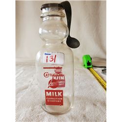 1 QUART CARNATION MILK CREAM TOP BOTTLE WITH LID & SPOON