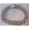 Image 2 : 8" STERLING SILVER CHARM BRACELET WITH 7 CHARMS