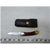 Image 1 : BUCK' BRAND FOLDER BLADE 2.5" SCALES ROSEWOOD. LEATHER SHEATH, SOLID.
