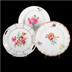 Three Porcelain Plates all with Florals.