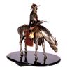 Image 5 : A mixed metal sculpture of a horseman.