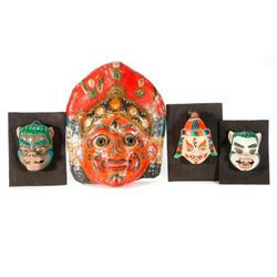 Four Nepalese masks.