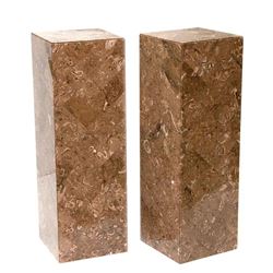 Pair of marble stands.