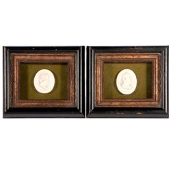 Two medallions of Roman emperors.